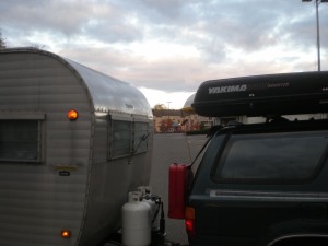 A glimpse og the 'rig', including emergency fuel and water along with the cargo roof box thanks to Jane and Craigslist